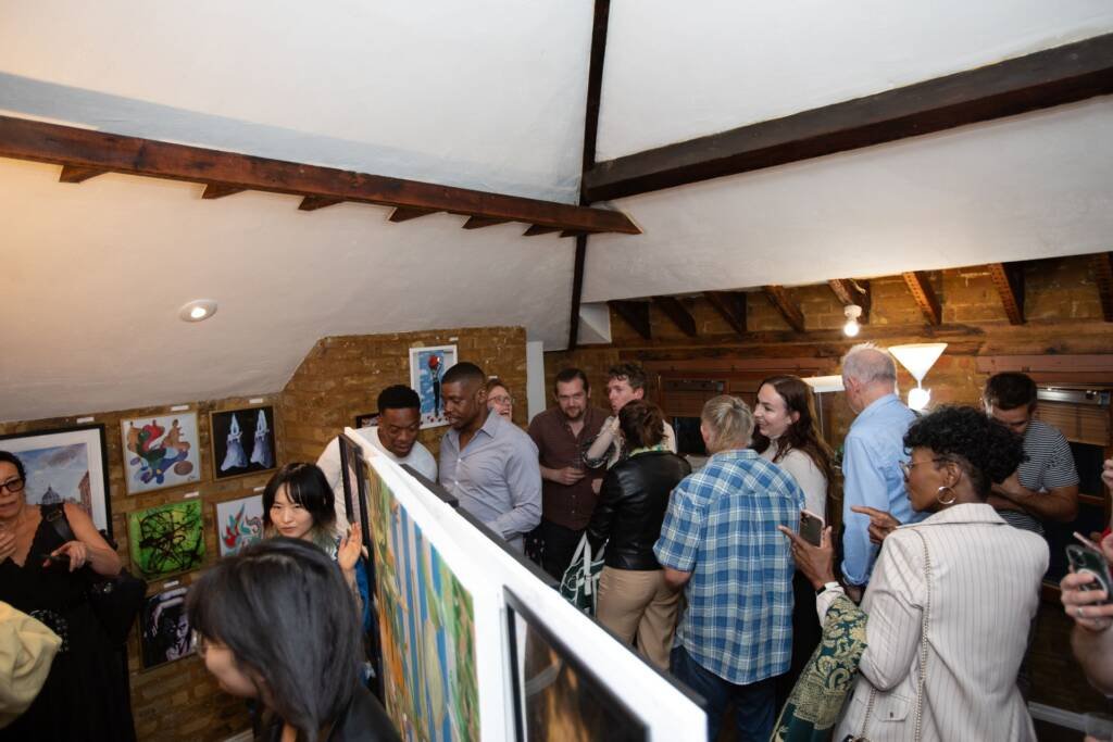 Guests attending the opening of The Vogue Seventh Edition exhibition at Boomer Gallery in London, featuring artworks by Aliya Bodnar.
