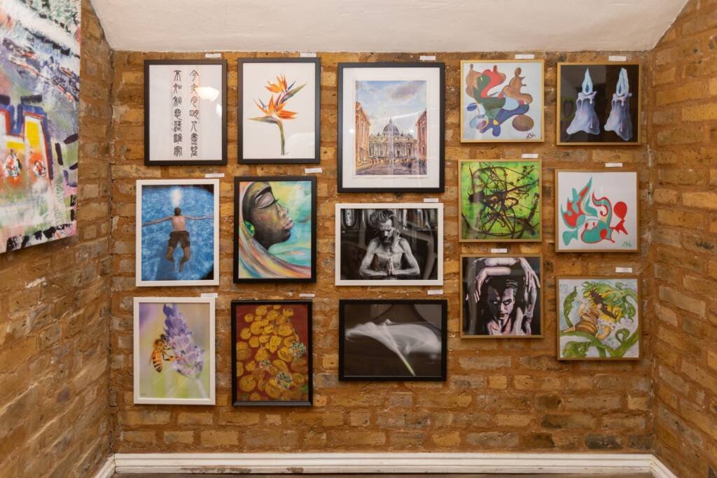 A collection of framed watercolor paintings by Aliya Bodnar displayed at The Vogue Seventh Edition Exhibition at Boomer Gallery, London.