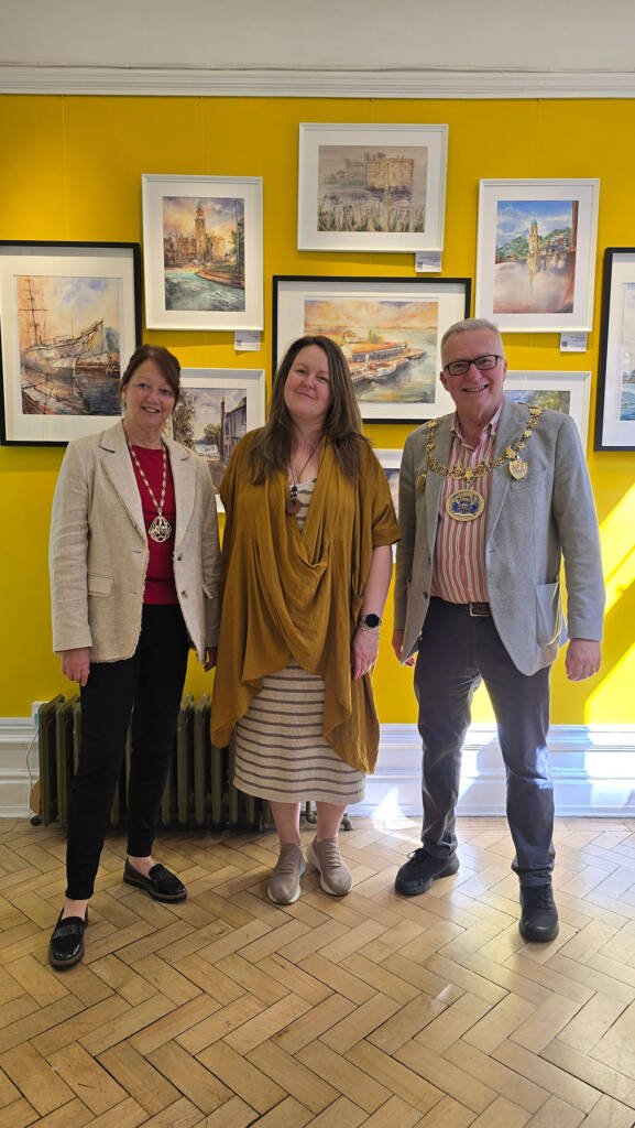 Aliya Bodnar with the Mayor of Rochester and his wife at her solo art exhibition opening.