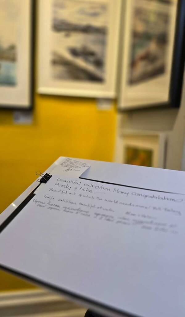 Handwritten messages in the visitor guestbook from Aliya Bodnar’s solo watercolour exhibition in Rochester, 2025.