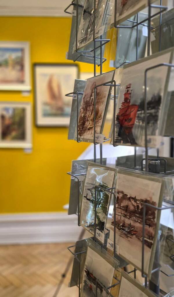 Original watercolour postcards by Aliya Bodnar displayed at her 2025 solo exhibition in Rochester.