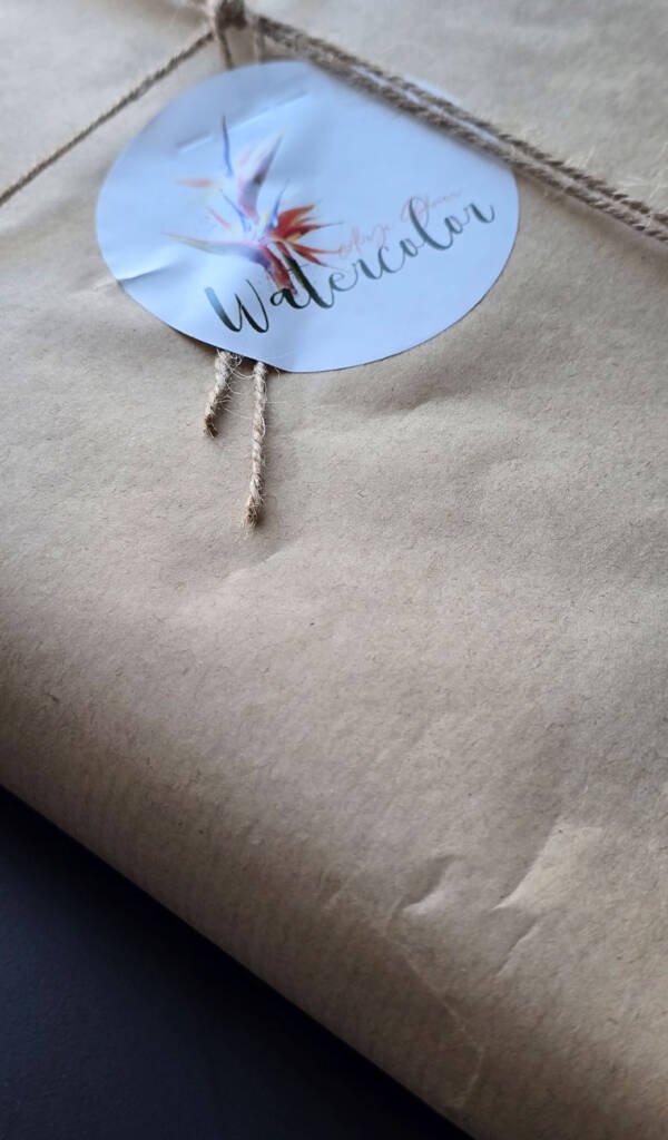 Eco-friendly wrapped artwork with a personalised touch, ready for shipping.