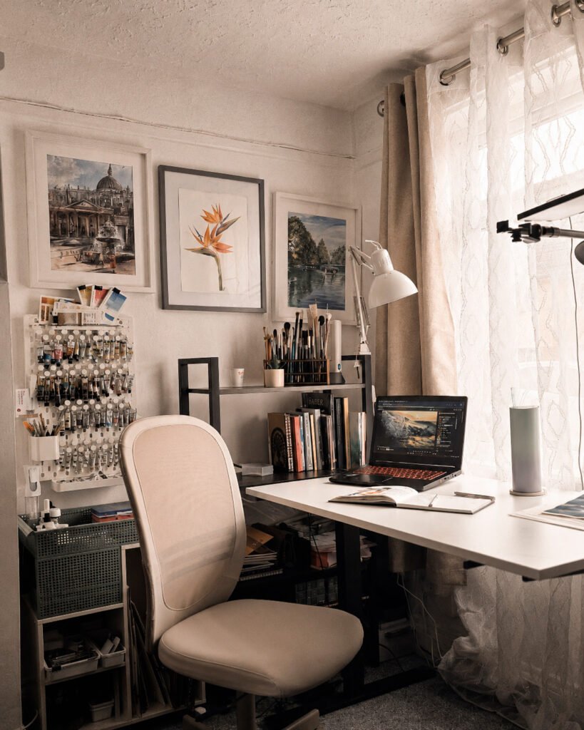 Aliya Bodnar's home art studio with watercolour paintings, brushes and creative workspace in Kent, UK