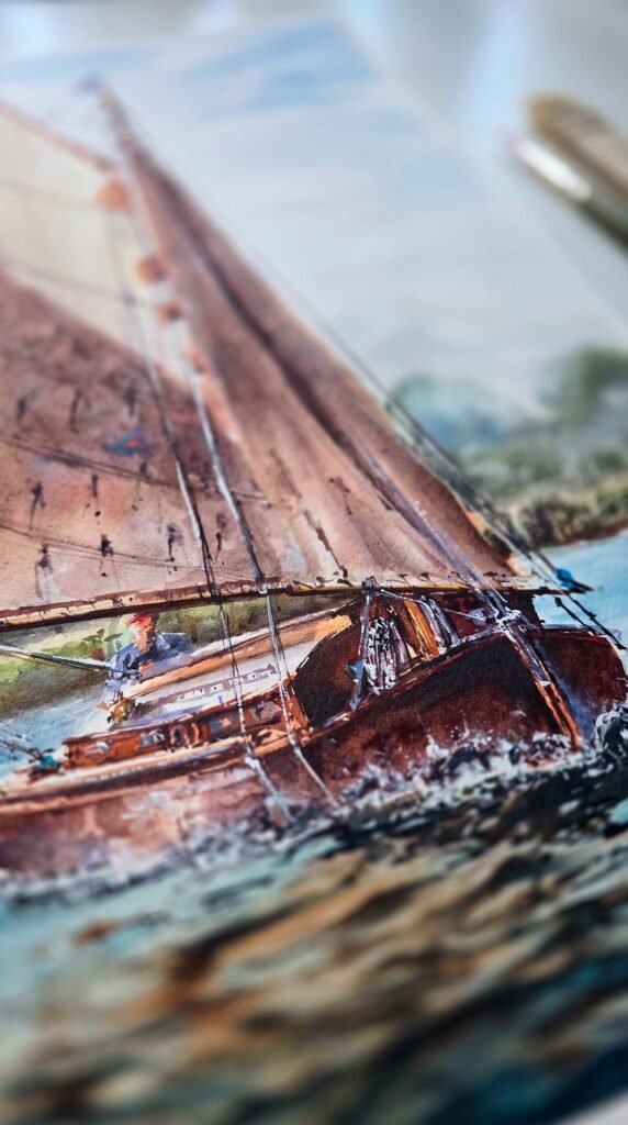Close-up of a sailing boat in Aliya Bodnar's original watercolour painting Sailing Stillness, showing the sail, rigging, wooden hull and moving water.